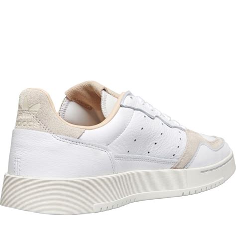 adidas supercourt heren wit beige|adidas Originals Supercourt sneakers in white .